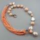 Collier corallo bamboo rosa e perle barocche bianche