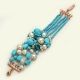 Bracciale multifilo pasta turchese 4 fiori perle coltivate