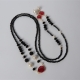 Collana a Cappio agata nera e castoni agata ruby