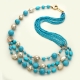 Collana a tre fili pasta turchese 4 fiori, perle coltivate acqua dolce